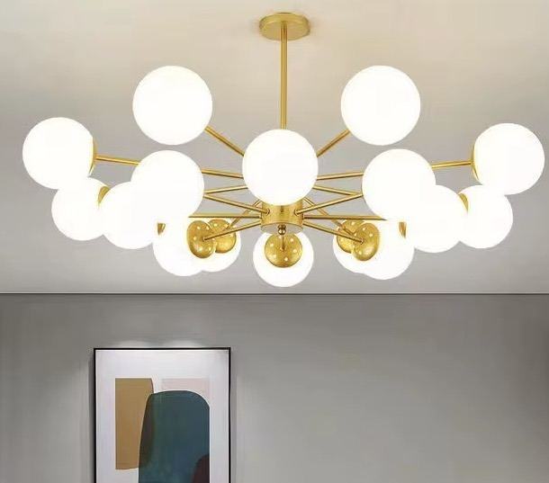 Lustre sputnik doré avec globes blancs — Watts, matériel électrique Dakar Sénégal